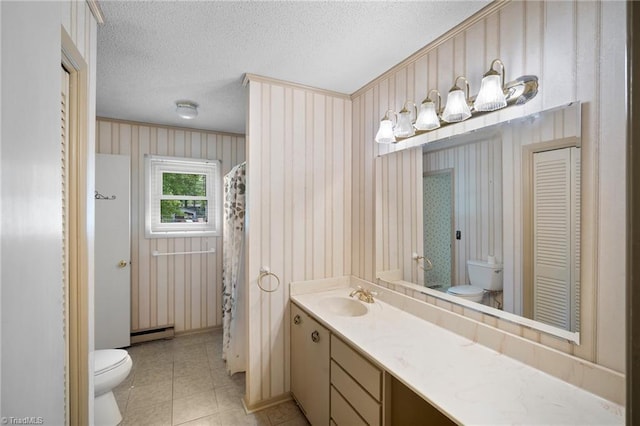 4904 Kacia Ct, Greensboro, NC 27407 - full bath with vanity, a closet, toilet, and a textured ceiling