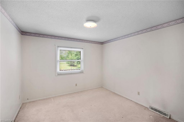 4904 Kacia Ct, Greensboro, NC 27407 - carpeted empty room featuring baseboards, a textured ceiling, and visible vents