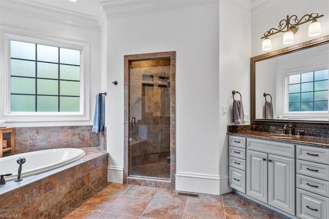 bathroom with a healthy amount of sunlight, plus walk in shower, and crown molding