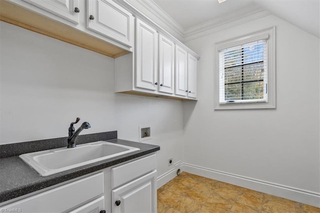 clothes washing area with crown molding, washer hookup, cabinets, sink, and electric dryer hookup