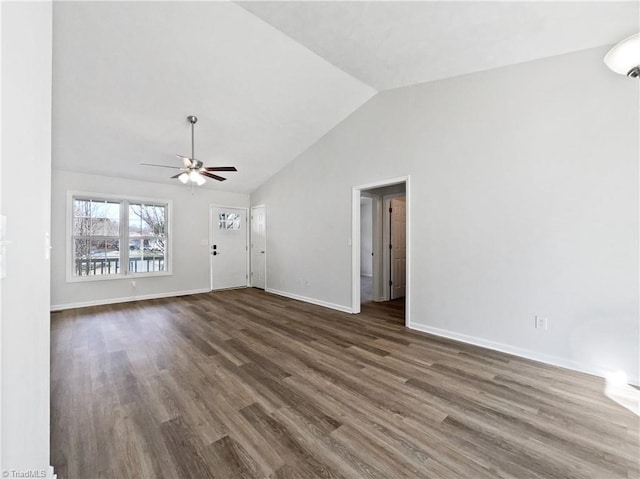 unfurnished living room with dark wood-style floors, high vaulted ceiling, baseboards, and ceiling fan