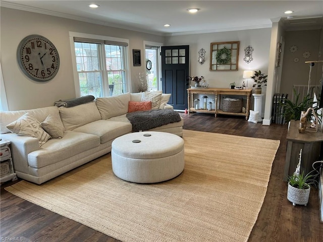 living area with dark wood-type flooring, recessed lighting, and ornamental molding