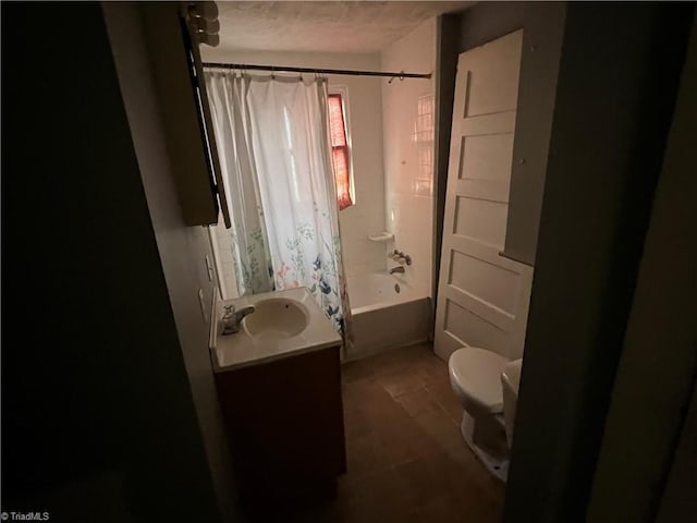 full bathroom with tile patterned floors, vanity, shower / bathtub combination with curtain, and toilet