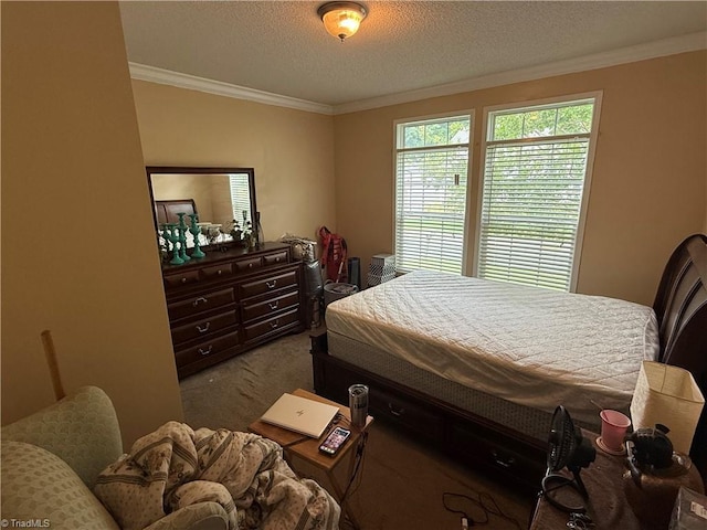 bedroom with dark colored carpet, ornamental molding, and a textured ceiling