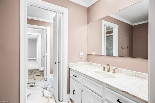 bathroom featuring vanity and ornamental molding