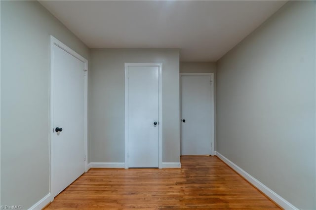 unfurnished bedroom featuring light hardwood / wood-style flooring