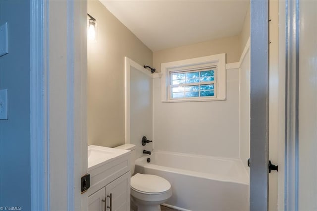 full bathroom with bathtub / shower combination, vanity, and toilet