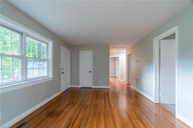 empty room with light wood-type flooring