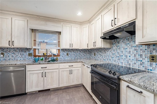 kitchen with sink, dishwasher, light stone counters, tasteful backsplash, and black / electric stove