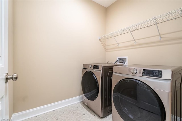 2209 Starfall Dr, Colfax, NC 27235 - washroom featuring washing machine and dryer and baseboards