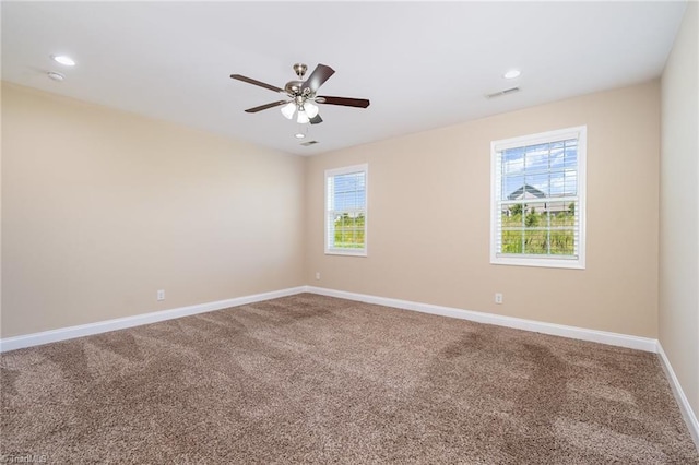 2209 Starfall Dr, Colfax, NC 27235 - carpeted spare room featuring plenty of natural light, a ceiling fan, and recessed lighting
