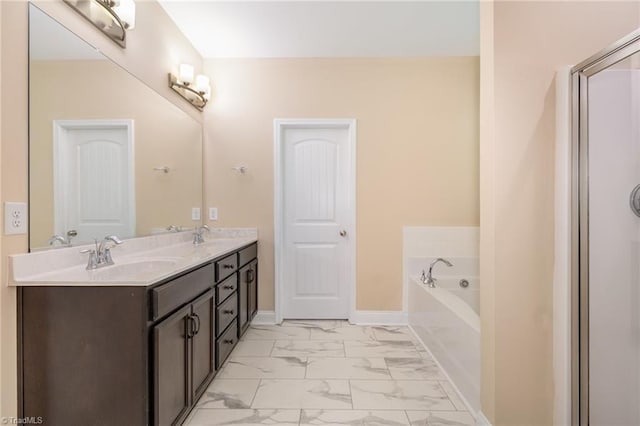 2209 Starfall Dr, Colfax, NC 27235 - full bathroom featuring marble finish flooring, double vanity, and a bath