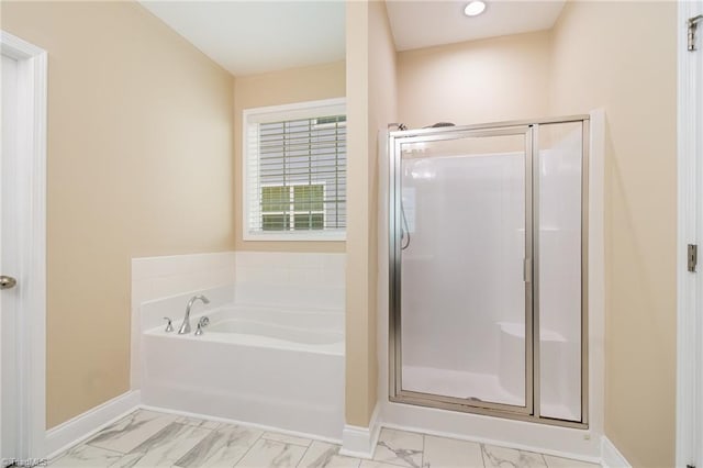 2209 Starfall Dr, Colfax, NC 27235 - bathroom with marble finish flooring, a bath, and a shower stall