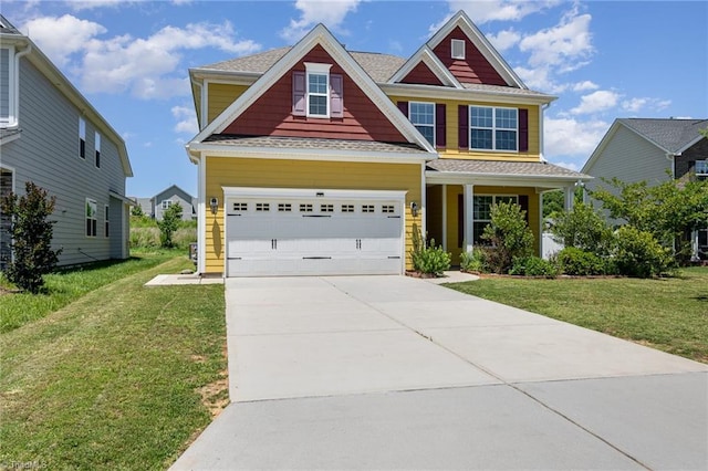 2209 Starfall Dr, Colfax, NC 27235 - craftsman-style house with a front yard, driveway, and covered porch