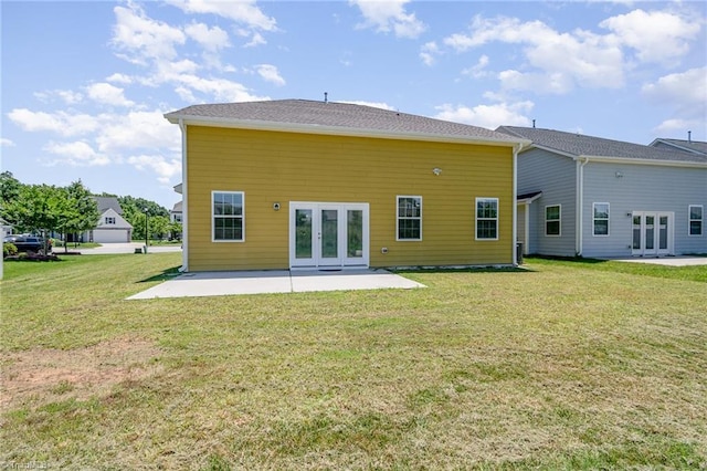 2209 Starfall Dr, Colfax, NC 27235 - back of house with french doors, a patio area, and a lawn