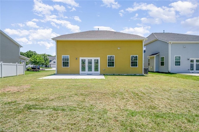 2209 Starfall Dr, Colfax, NC 27235 - rear view of house with french doors and a patio area
