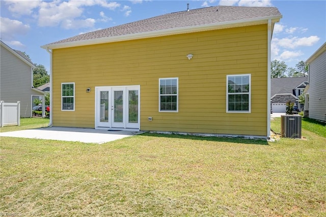 2209 Starfall Dr, Colfax, NC 27235 - back of house featuring a patio, a yard, and french doors