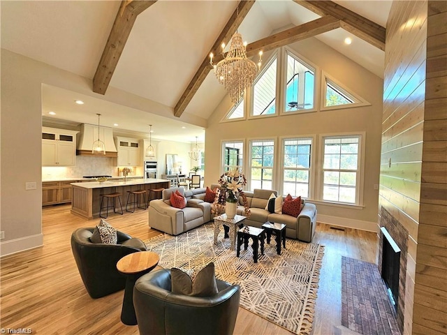LOT121 N Holden Rd, Greensboro, NC 27410 - living room with a chandelier, beamed ceiling, light wood-style flooring, high vaulted ceiling, and recessed lighting
