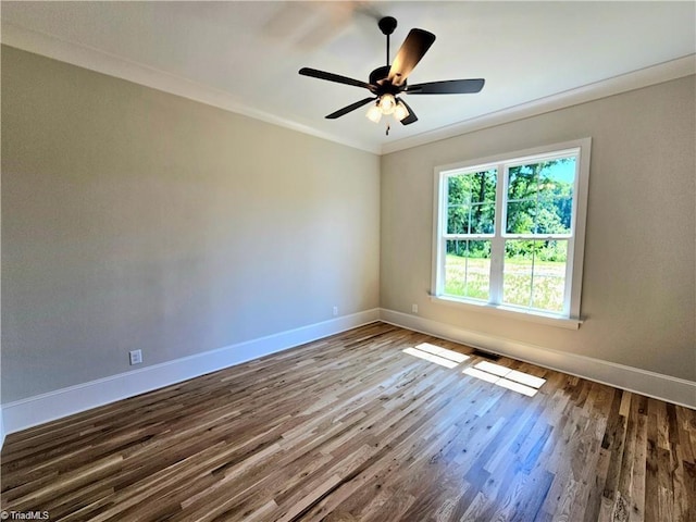 LOT121 N Holden Rd, Greensboro, NC 27410 - spare room featuring wood finished floors, ornamental molding, and ceiling fan