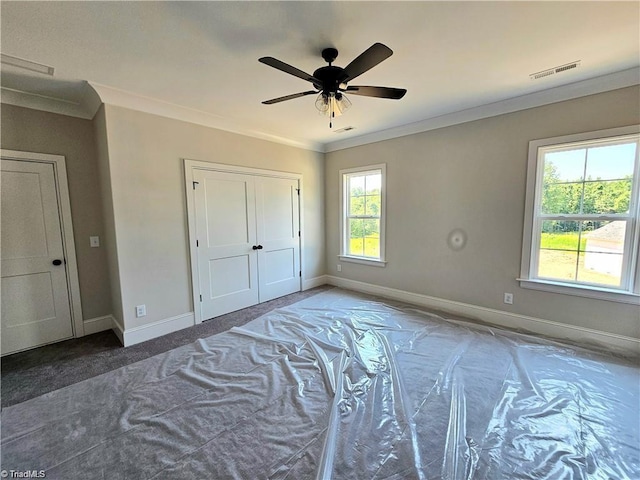 LOT121 N Holden Rd, Greensboro, NC 27410 - unfurnished bedroom featuring ornamental molding, carpet flooring, and a ceiling fan