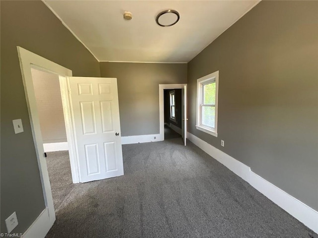 unfurnished bedroom with carpet