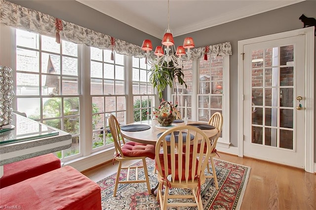 sunroom with a chandelier