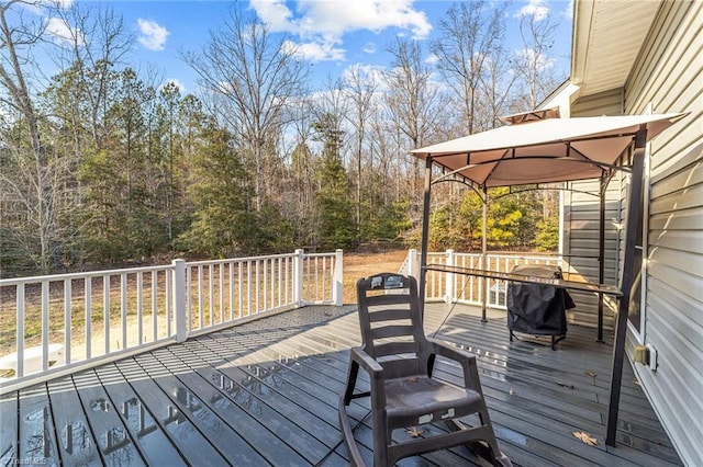 wooden deck with a gazebo