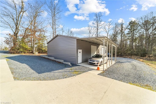 view of side of home featuring a carport