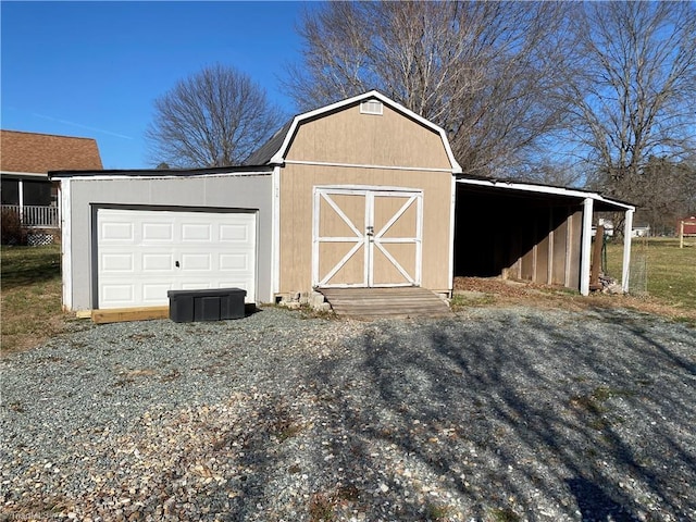 view of outdoor structure featuring a garage