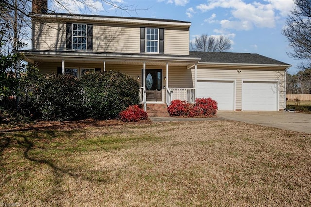 front of property featuring a garage, a front yard, and a porch