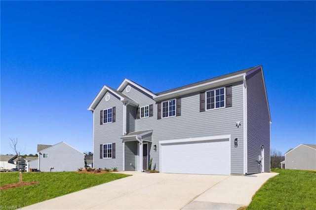 view of front of house with driveway, an attached garage, and a front lawn