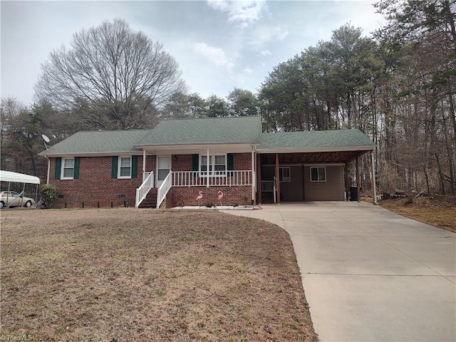 ranch-style home featuring covered porch, brick siding, a shingled roof, crawl space, and a front lawn