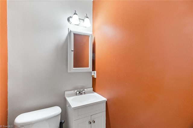 516 John St, Eden, NC 27288 - half bathroom featuring vanity and toilet