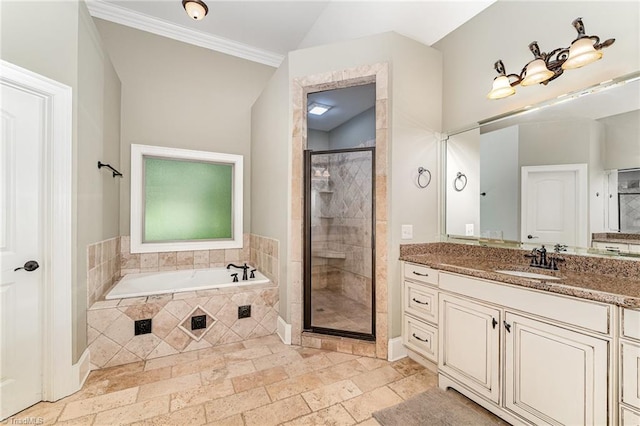 5216 Harley Stafford Dr, Oak Ridge, NC 27310 - full bath featuring a garden tub, vanity, a shower stall, stone tile flooring, and ornamental molding