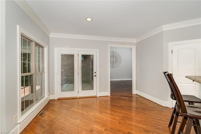 5216 Harley Stafford Dr, Oak Ridge, NC 27310 - unfurnished office with ornamental molding, wood finished floors, healthy amount of natural light, and recessed lighting