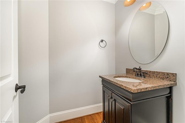 5216 Harley Stafford Dr, Oak Ridge, NC 27310 - bathroom featuring vanity and wood finished floors
