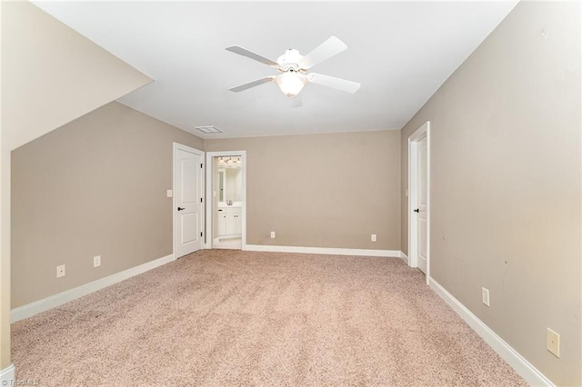 5216 Harley Stafford Dr, Oak Ridge, NC 27310 - unfurnished room featuring ceiling fan and light carpet