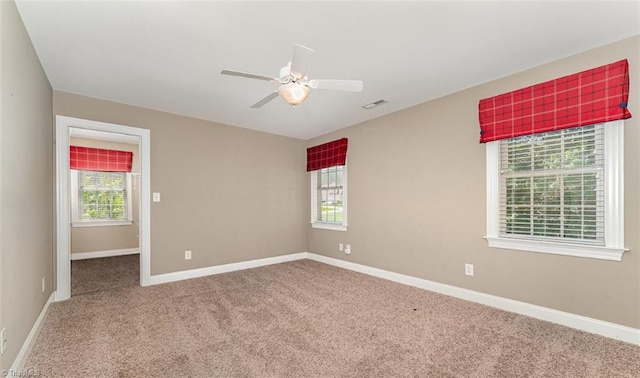 5216 Harley Stafford Dr, Oak Ridge, NC 27310 - carpeted empty room featuring ceiling fan and baseboards