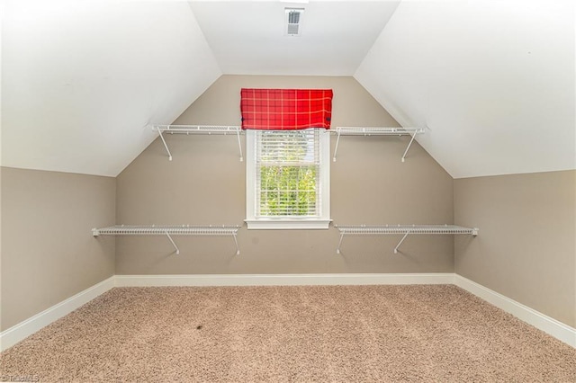 5216 Harley Stafford Dr, Oak Ridge, NC 27310 - spacious closet featuring carpet flooring and lofted ceiling