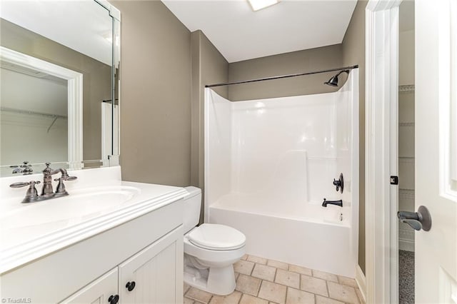 5216 Harley Stafford Dr, Oak Ridge, NC 27310 - bathroom with vanity, shower / bathtub combination, and a walk in closet