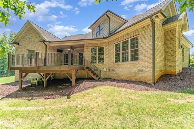 5216 Harley Stafford Dr, Oak Ridge, NC 27310 - rear view of house featuring a ceiling fan, a wooden deck, stairs, crawl space, and a lawn