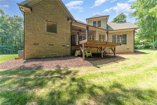 5216 Harley Stafford Dr, Oak Ridge, NC 27310 - back of house with crawl space, brick siding, a lawn, and a deck