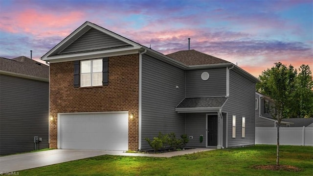 824 Sage Hill Dr, Jamestown, NC 27282 - view of front of house featuring an attached garage, driveway, and brick siding