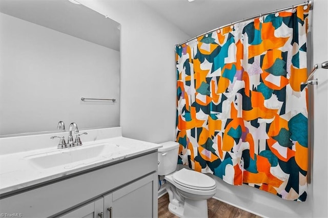 824 Sage Hill Dr, Jamestown, NC 27282 - full bathroom featuring wood finished floors and vanity