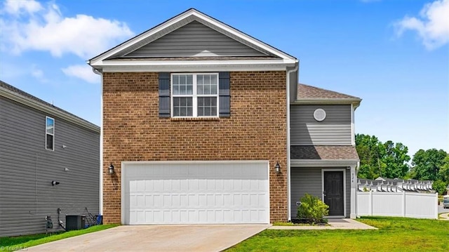 824 Sage Hill Dr, Jamestown, NC 27282 - view of front facade featuring a garage, brick siding, and driveway