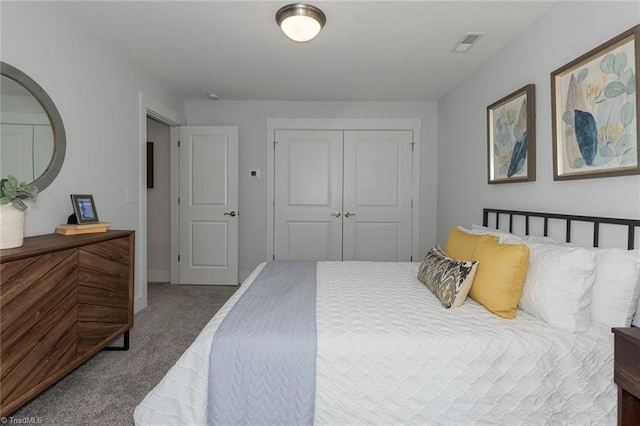 bedroom featuring carpet and a closet