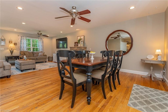 dining area featuring light wood-style floors, recessed lighting, ceiling fan, and baseboards