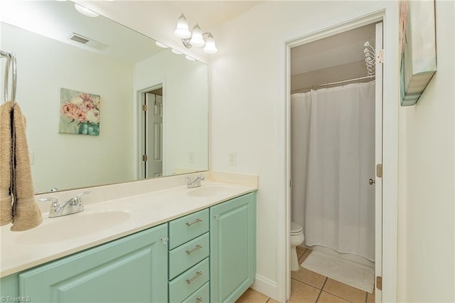 full bathroom with double vanity, tile patterned flooring, a sink, and visible vents