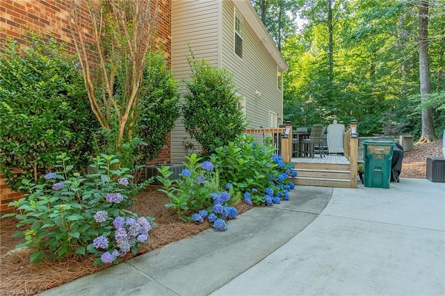 view of home's exterior featuring a deck