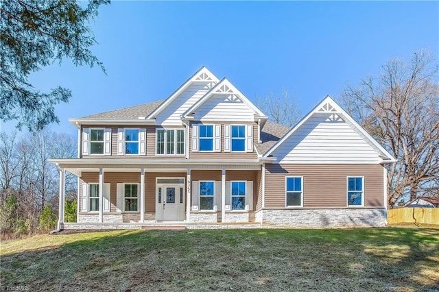 view of front of house featuring a front lawn and a porch